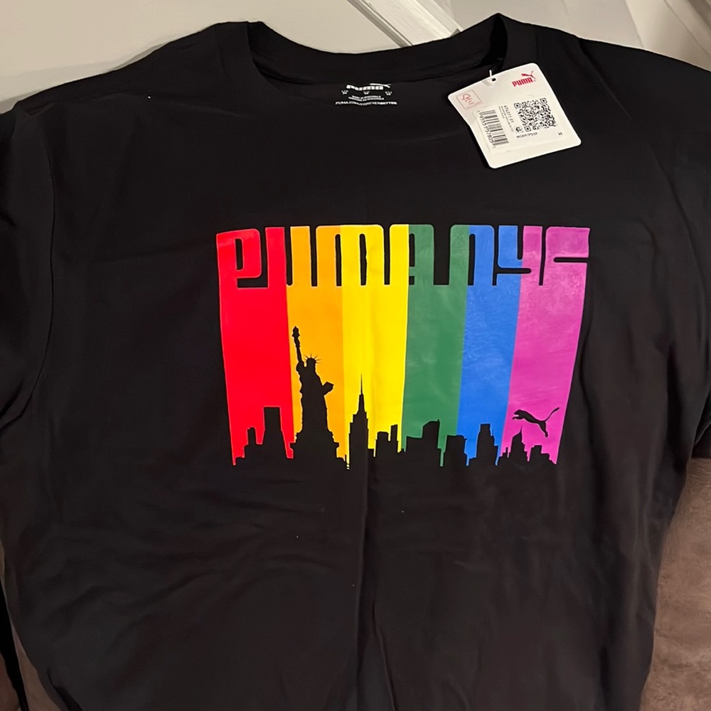 Brand new with tags rainbow skyline Puma shirt. Size M